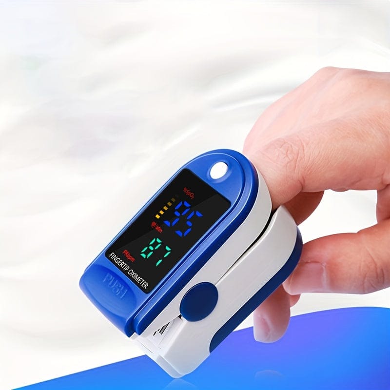 Pulsoximeter placerad på fingertoppen under mätning