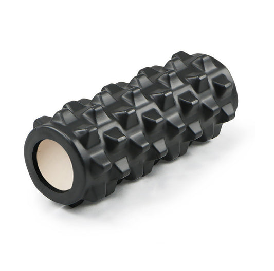 Svart foam roller med strukturerad yta för muskelmassage.