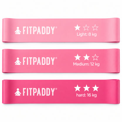 Tre rosa Fitpaddy motståndsband med motståndsnivåerna 8 kg, 12 kg och 16 kg