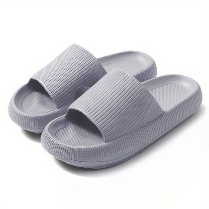 Gråa mjuka tofflor