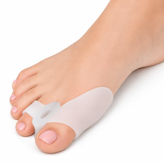 Tåspridare i silikon vid hallux valgus, placerad mellan stortån och intilliggande tå.