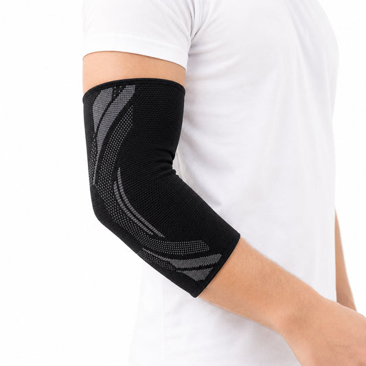 Svart armbågsstöd med kompression som ger stabilitet och stöd vid tennisarmbåge, träning och vardaglig aktivitet.