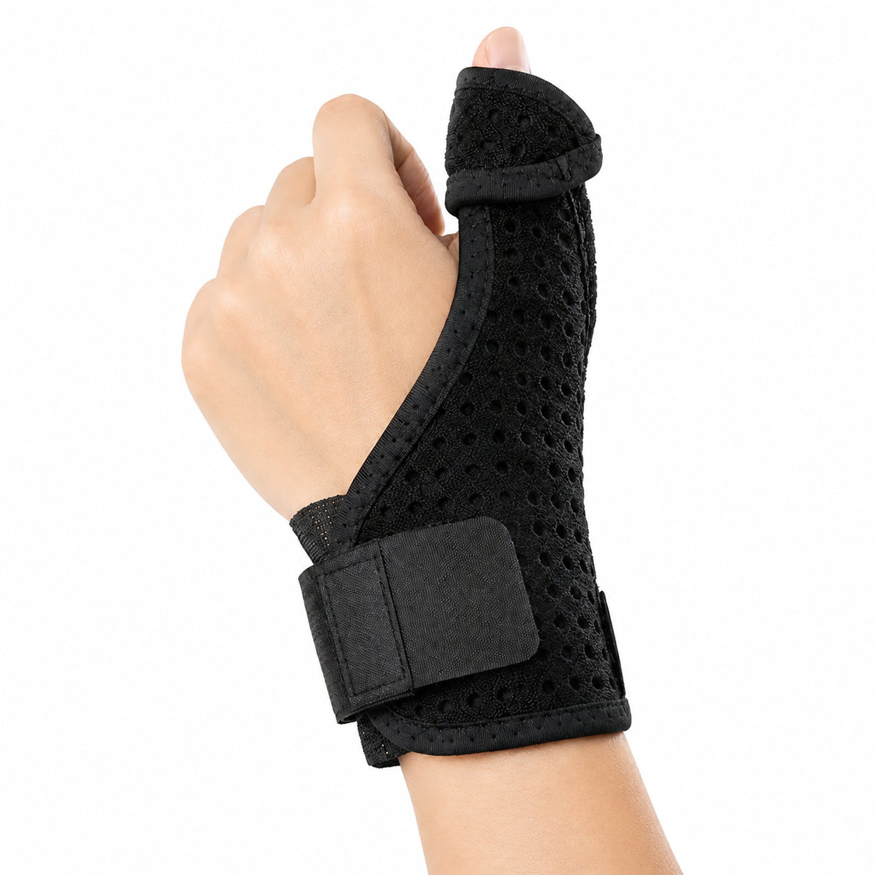 Tumortos med justerbar handledsrem som stabiliserar tummen, avlastar tumbleden och ger stöd vid smärta eller skada.